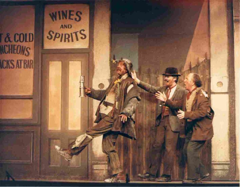 Peter Bayliss as Alfred Doolittle with company