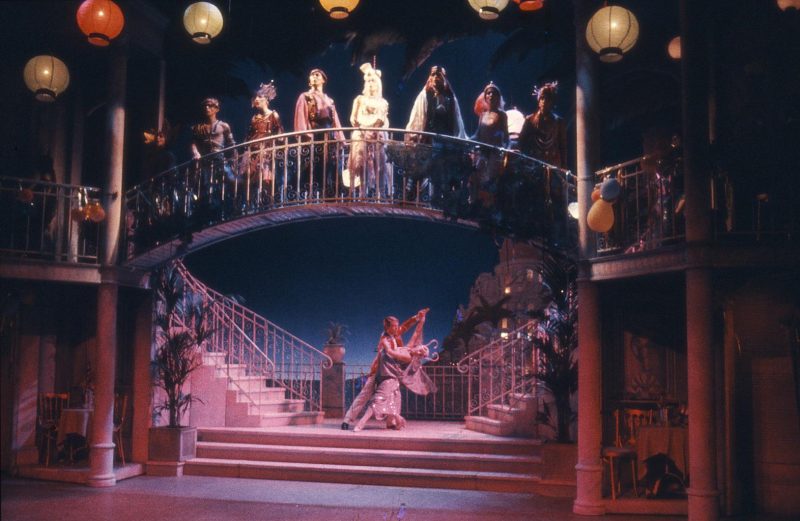 Bob Newent as Bobby and Linda Mae Brewer as Maisie dancing, with the company behind in The Boyfriend